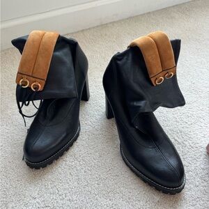 Stuart Weitzman Black and Tan Heeled Boots